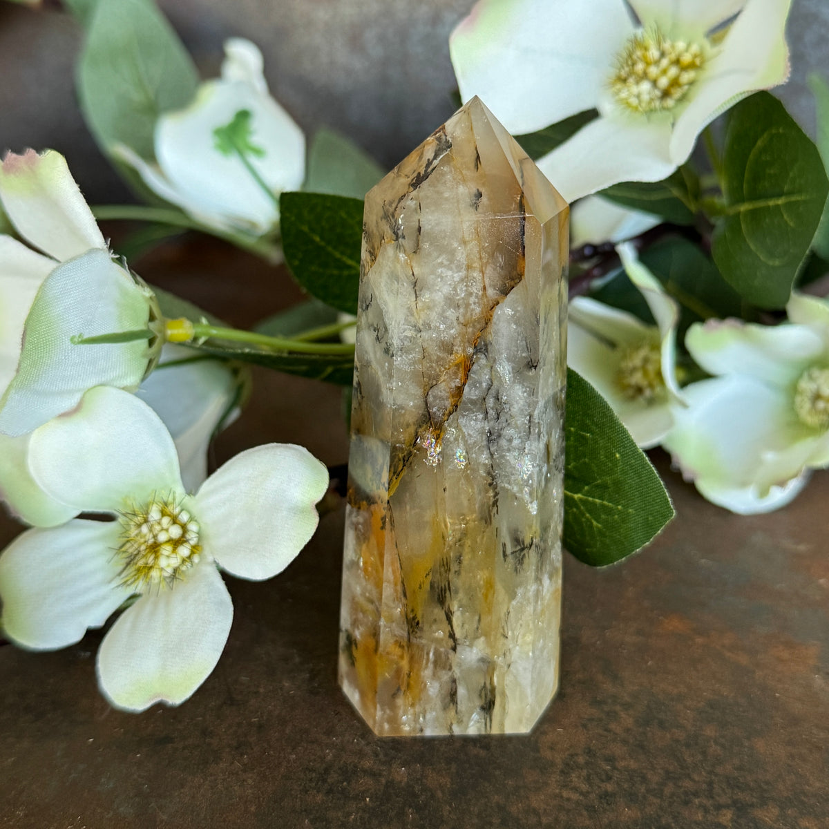 126g · 91mm
Golden Healer Quartz Tower, 126g and 91mm tall, with deep amber-orange colouring and natural internal fractures
