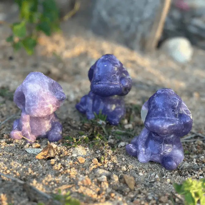 Lepidolite Eeyore crystal carving for stress relief, emotional balance, calm, grounding, deep emotional healing, and pop culture collectible décor.