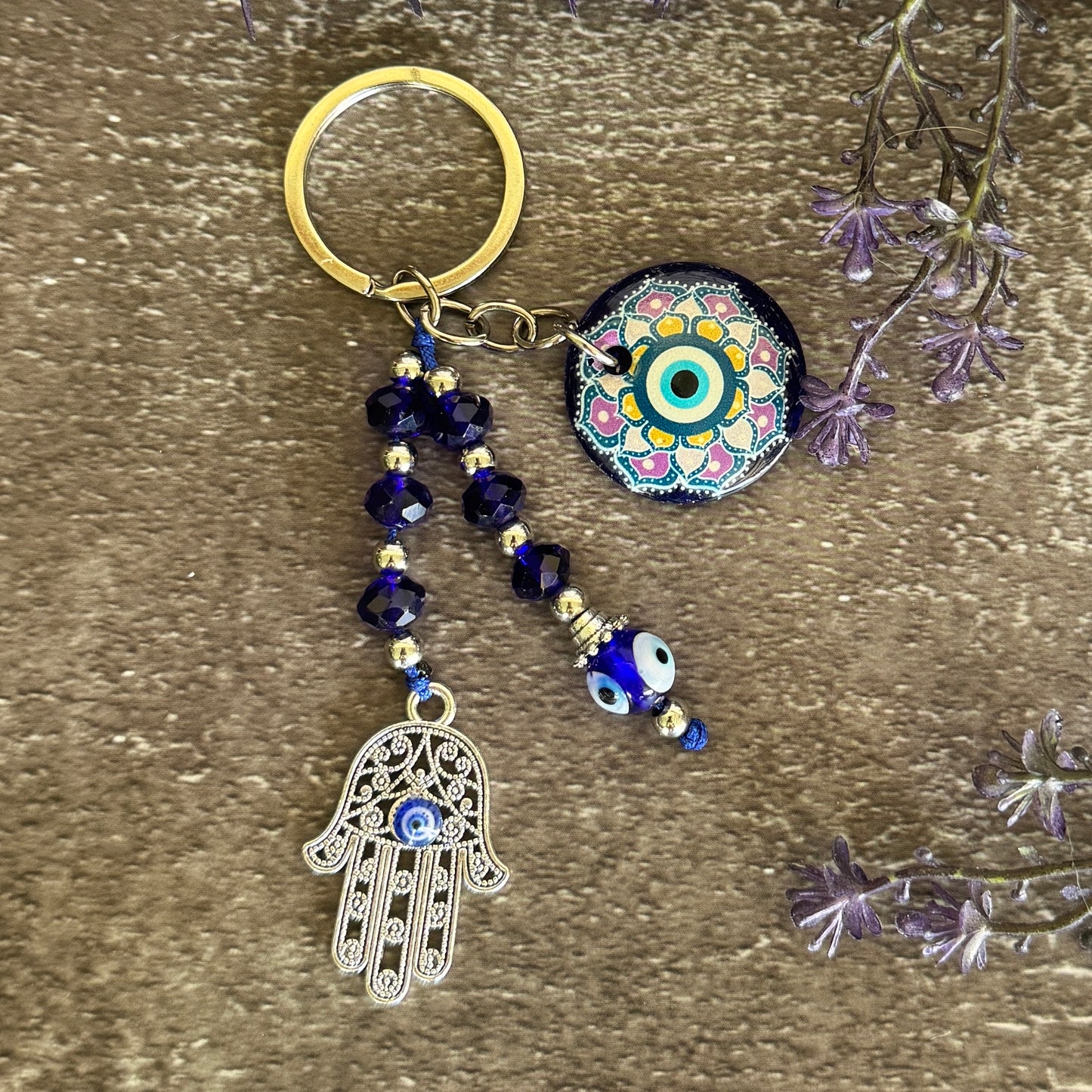 Evil Eye and Hamsa Hand keychain with colourful mandala glass Evil Eye disc, dark navy crystal beads and silver-tone filigree Hamsa charm