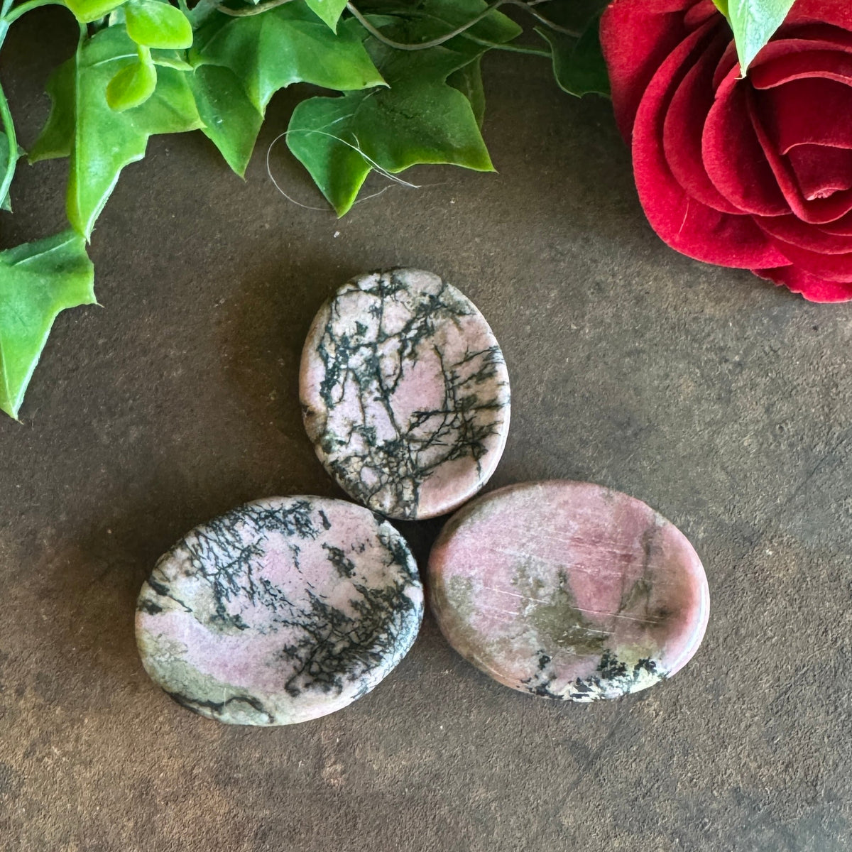 Rhodonite worry stone for emotional healing, compassion and balance