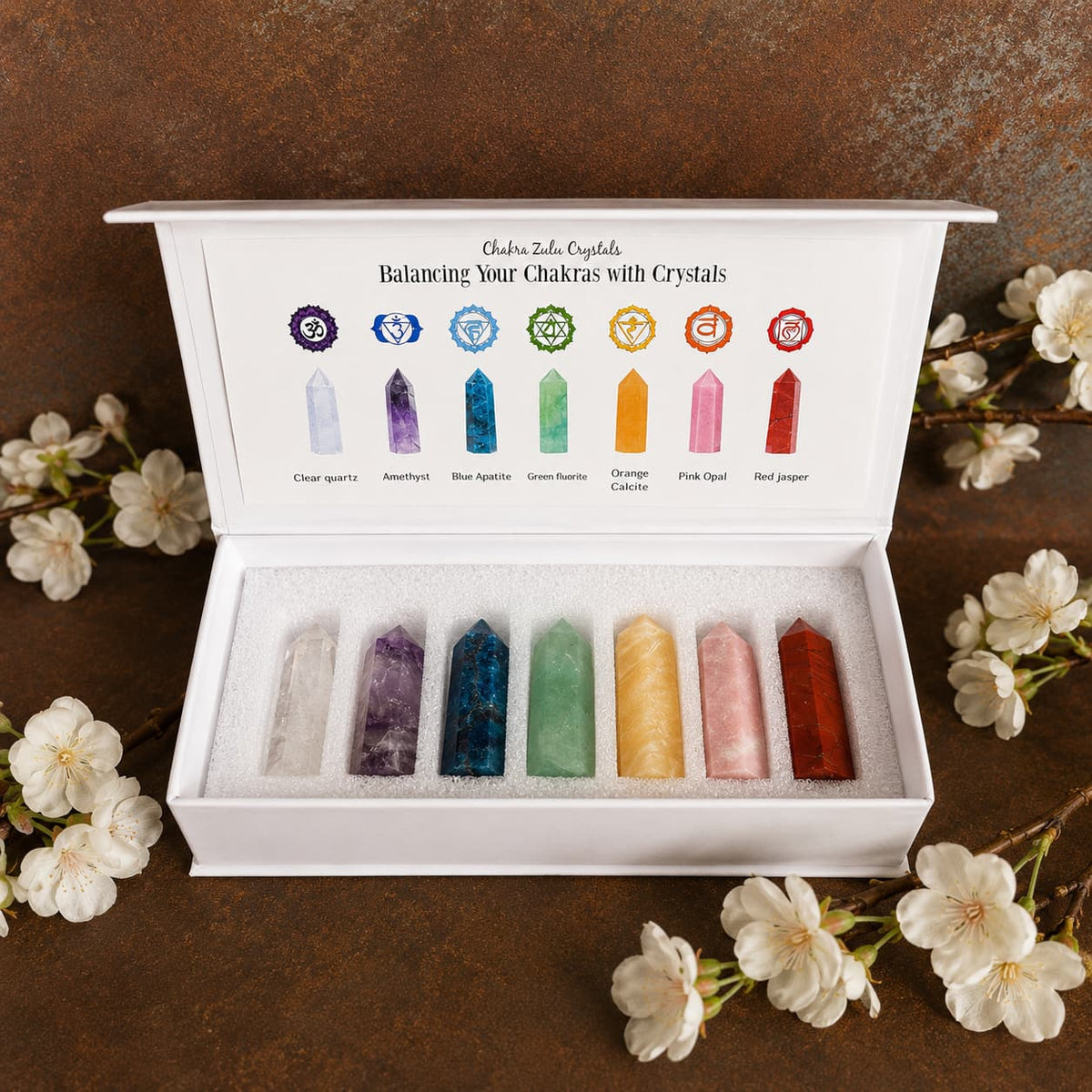 Seven crystal chakra tower set Style C with Clear Quartz, Amethyst, Blue Apatite, Green Fluorite, Orange Calcite, Pink Opal and Red Jasper