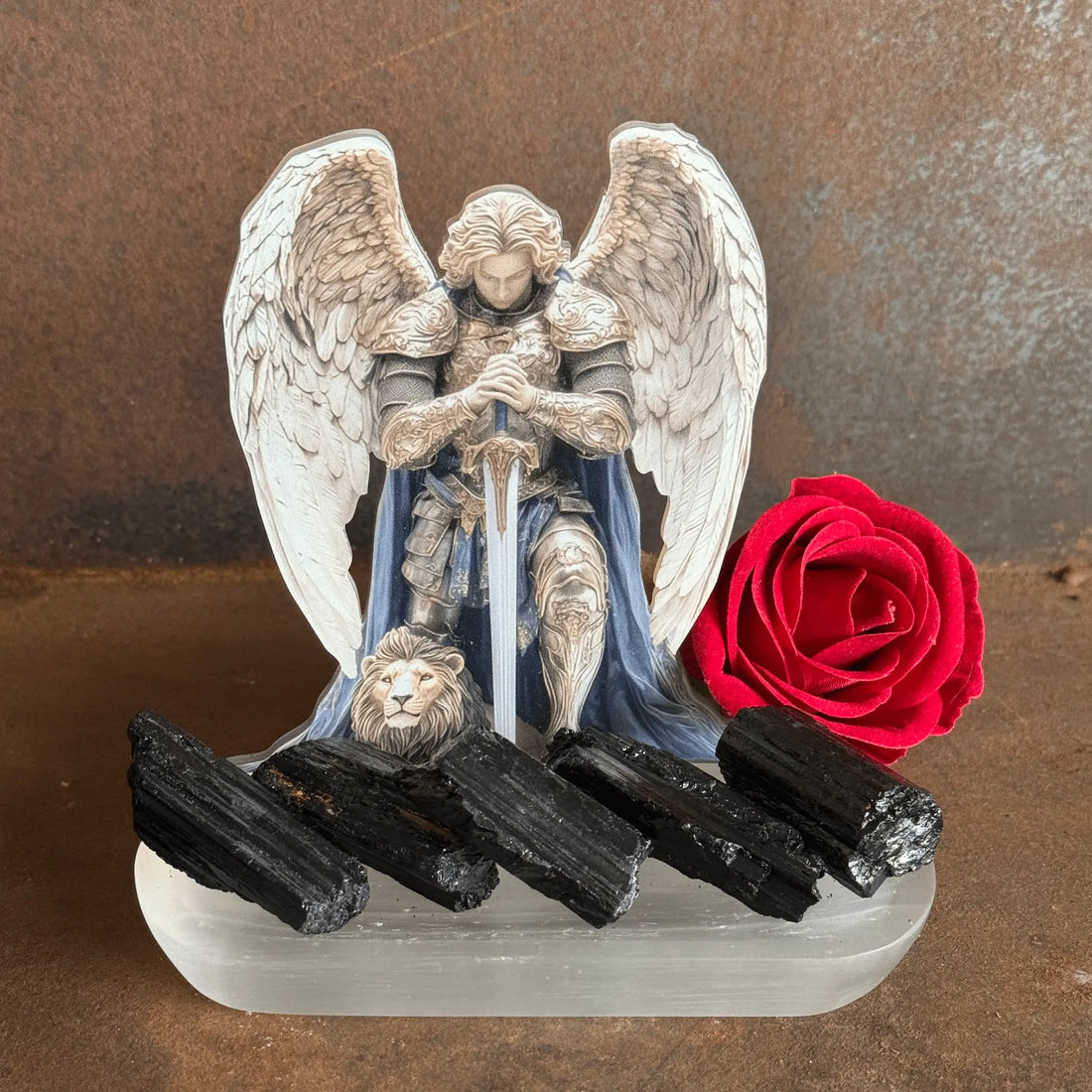 Archangel Michael statue with Black Tourmaline crystals and red rose symbolising spiritual protection and grounding