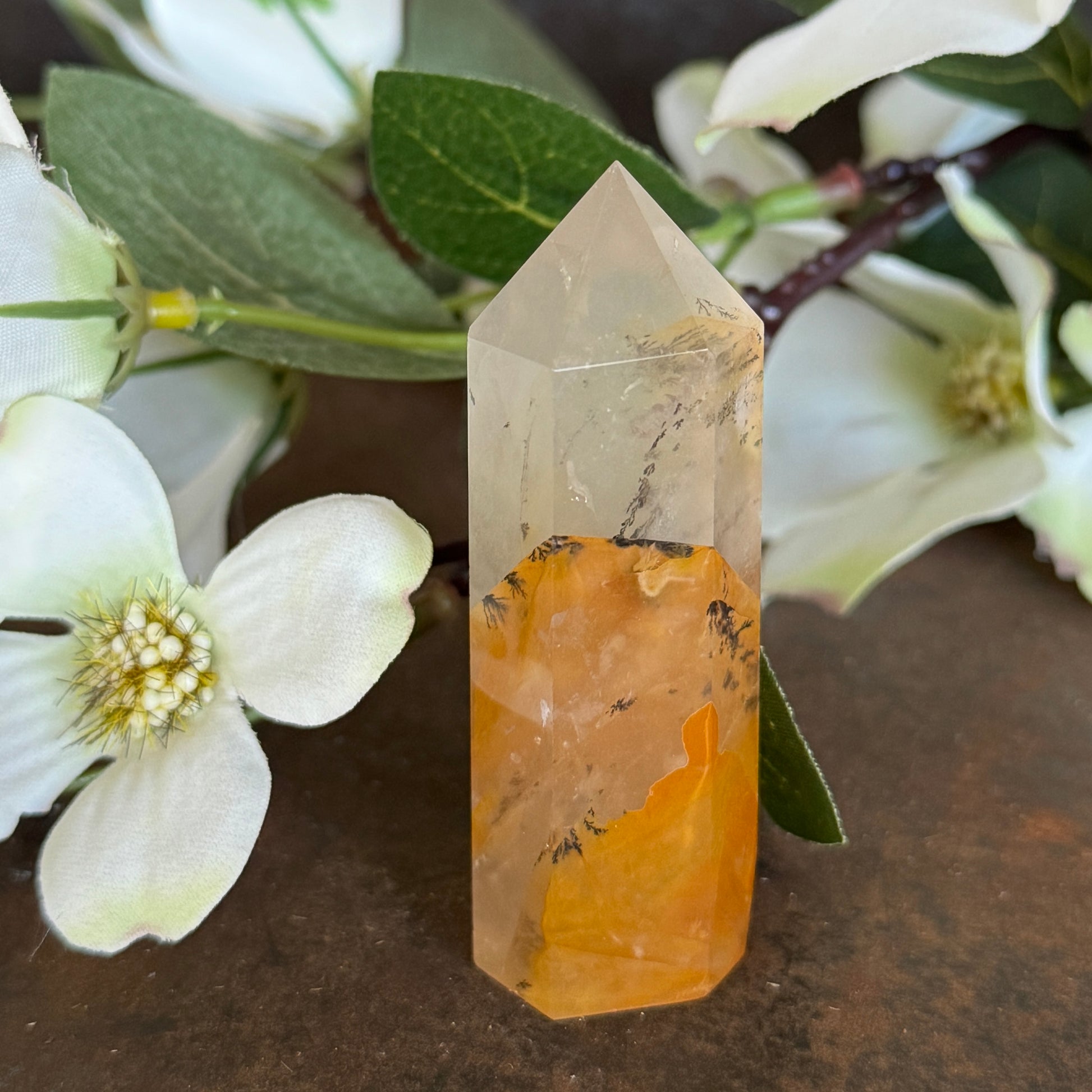 56g · 70mm
Golden Healer Quartz Tower, 56g and 70mm tall, with pale clear Quartz, a vivid orange centre and branch-like mineral patterning