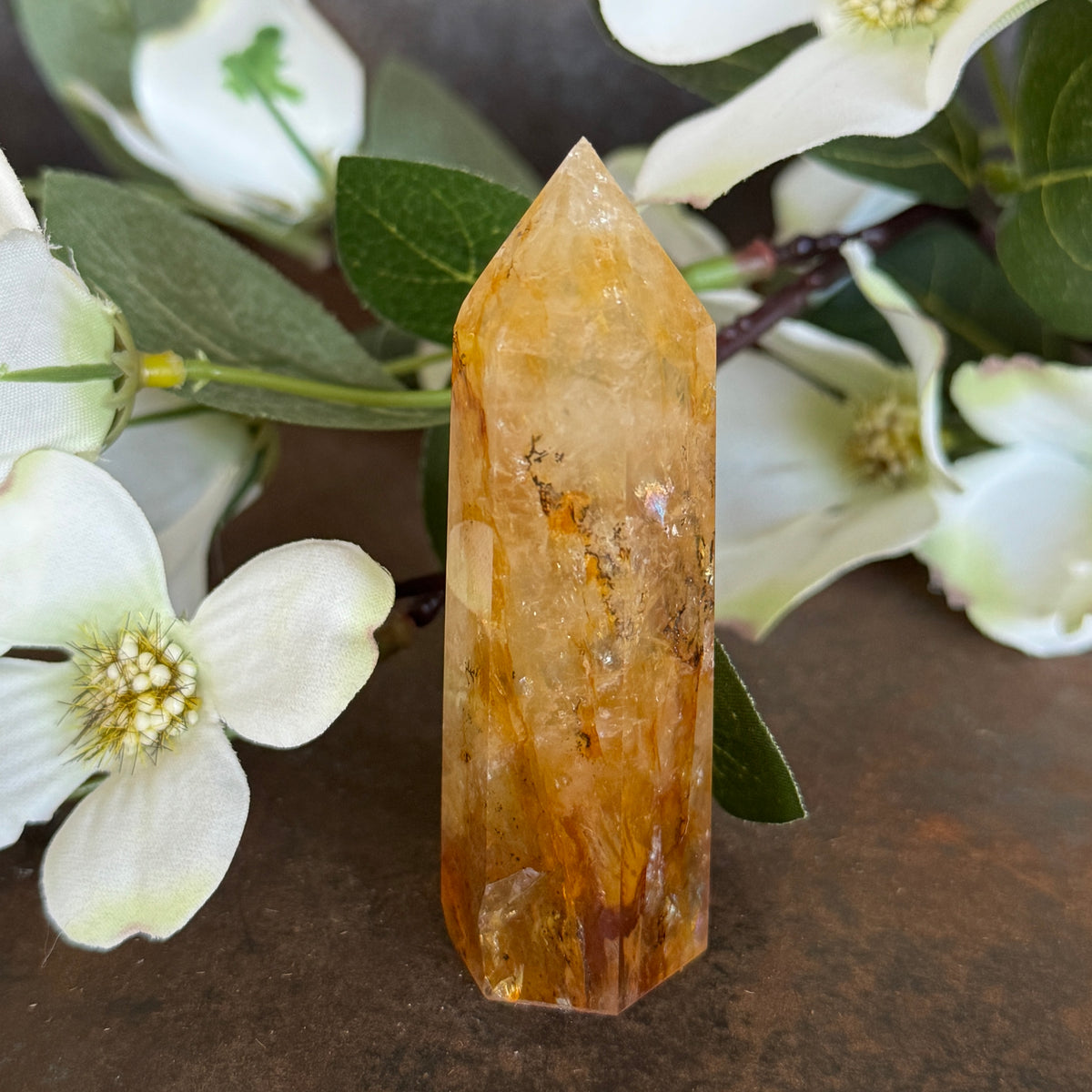 68g · 79mm
Golden Healer Quartz Tower, 68g and 79mm tall, with golden-orange colouring and dark branch-like mineral patterning