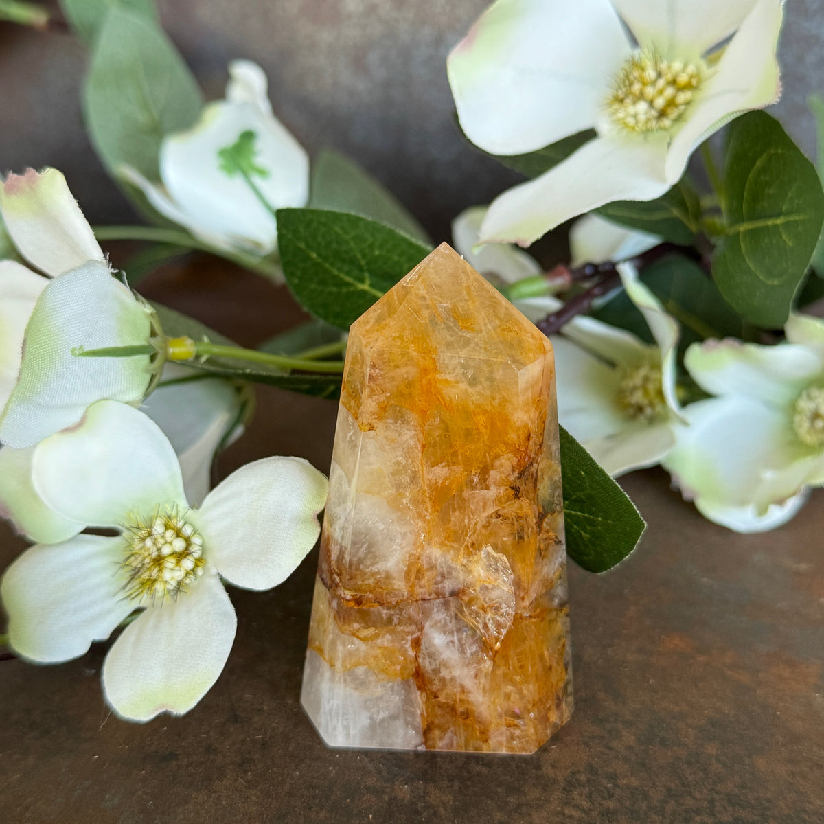 94g · 74mm
Golden Healer Quartz Tower, 94g and 74mm tall, with a clear upper section, vivid orange centre and branch-like mineral patterning