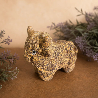 Calligraphy Jasper Highland Cow crystal carving with warm brown and cream script-like patterns and hand-carved details
