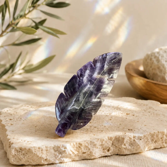 Chevron Amethyst crystal feather carving with natural purple and white banding, hand-carved and polished