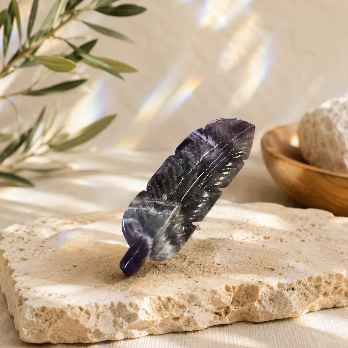 Chevron Amethyst crystal feather carving with natural purple and white banding, hand-carved and polished