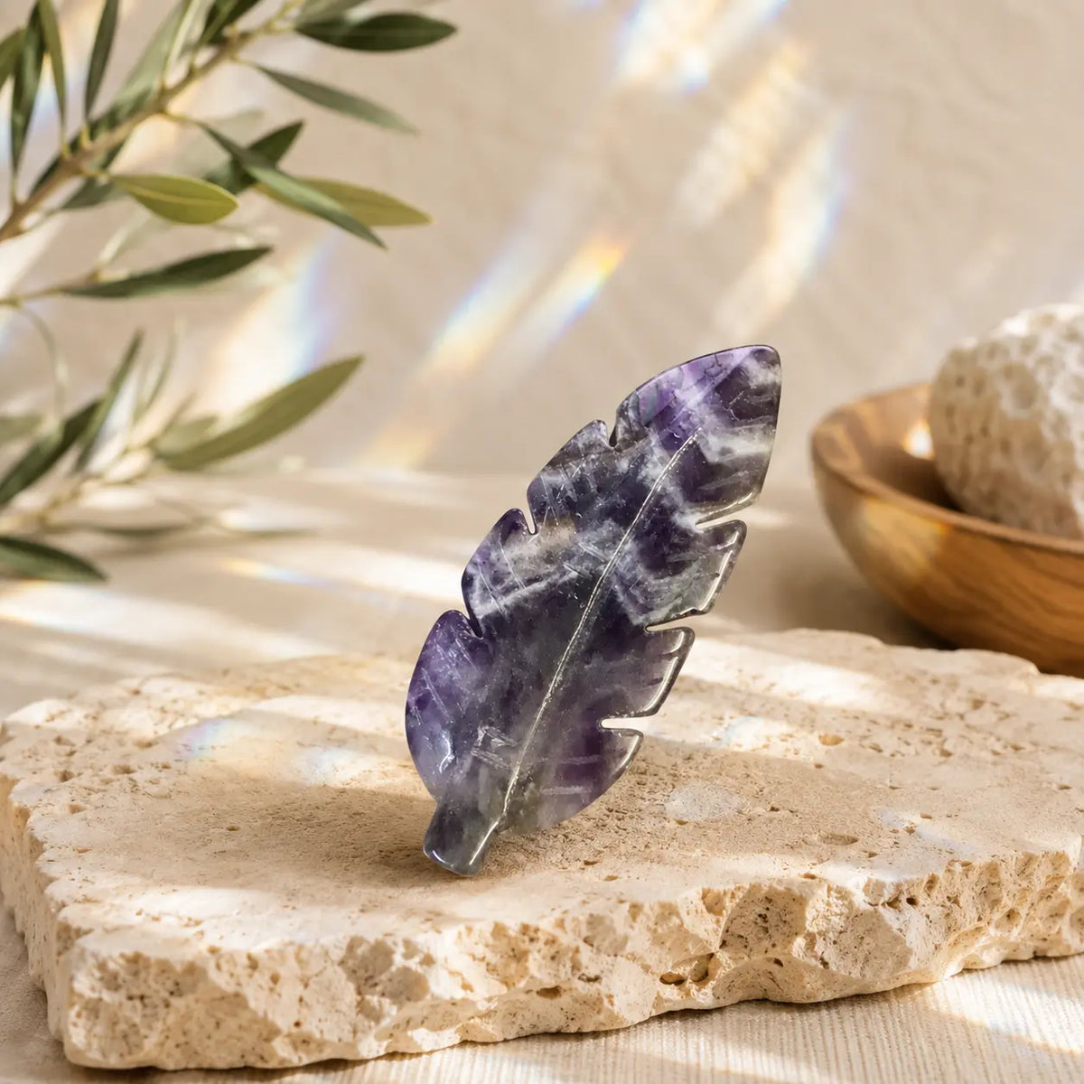 Chevron Amethyst crystal feather carving with natural purple and white banding, hand-carved and polished