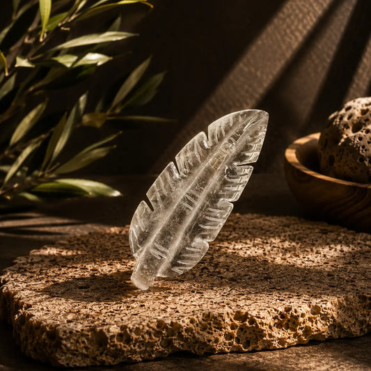 Clear Quartz feather carving with high translucency, fine internal veiling and ribbed carved detail