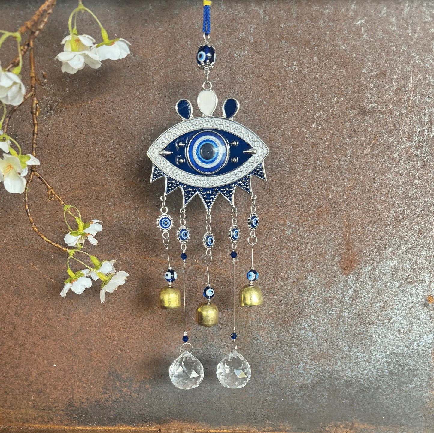 Evil Eye Wind Chime & Crystal Suncatcher Australia for spiritual protection, energy clearing, positive energy, emotional healing, intuition, sound vibration, and sacred home décor.