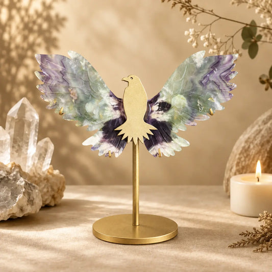 Feather Fluorite crystal wings on bird stand with layered natural crystal patterning