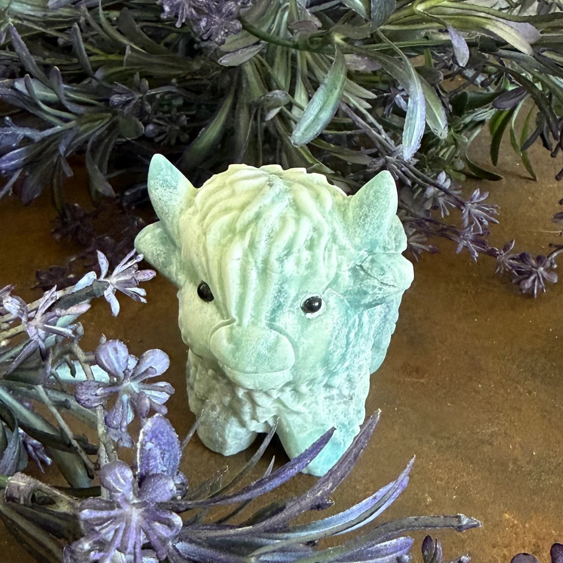 Green Moss Agate Highland Cow crystal carving with green moss-like mineral inclusions and hand-carved details