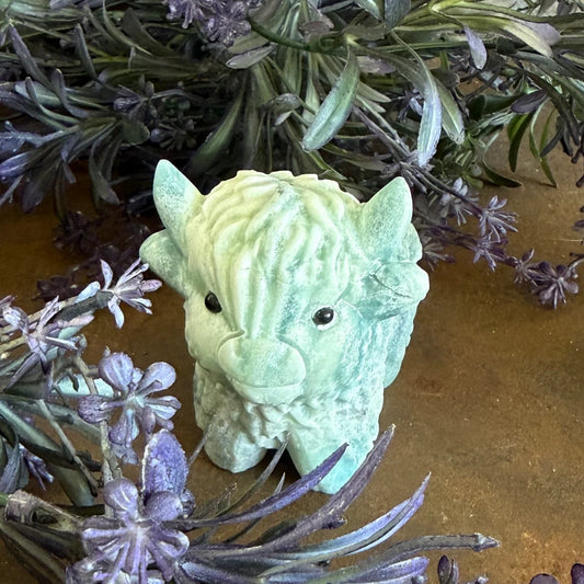 Green Moss Agate Highland Cow crystal carving with green moss-like mineral inclusions and hand-carved details