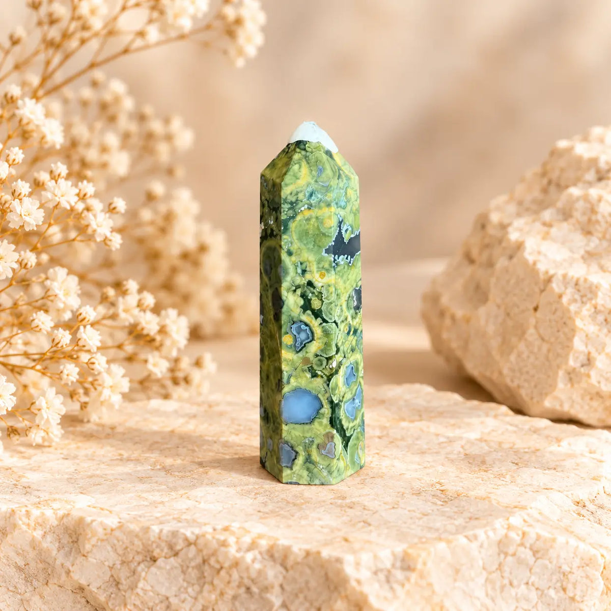 Green Rainforest Jasper crystal tower 72g approximately 8.4 x 2.3 cm with white protective tip cover