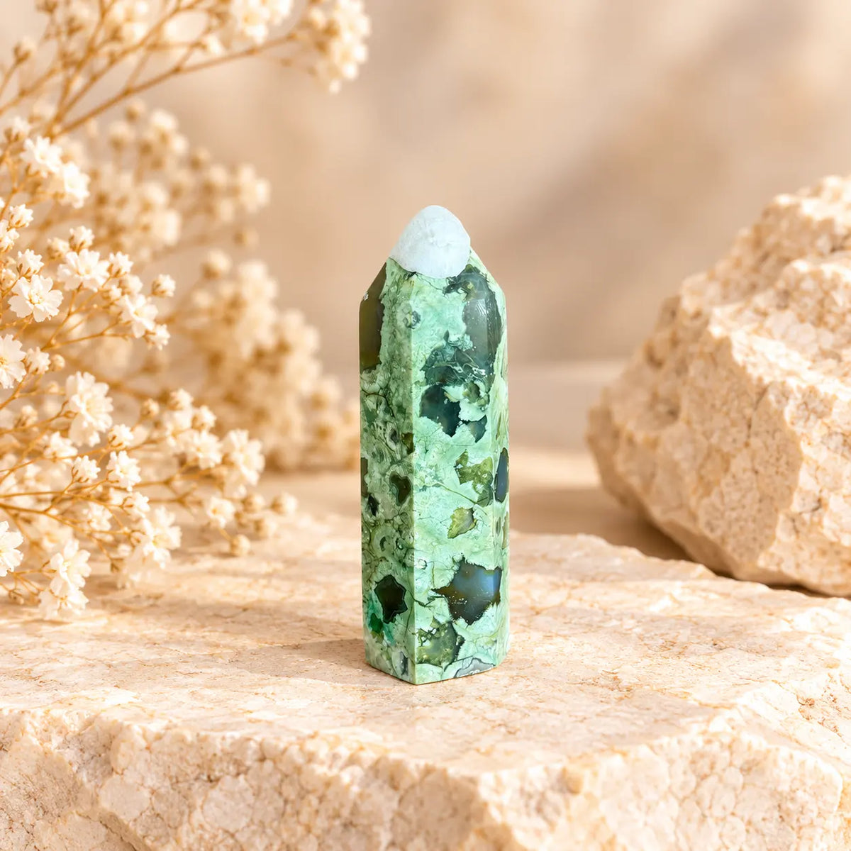 Green Rainforest Jasper crystal tower 81g approximately 8 x 2.3 cm with white protective tip cover