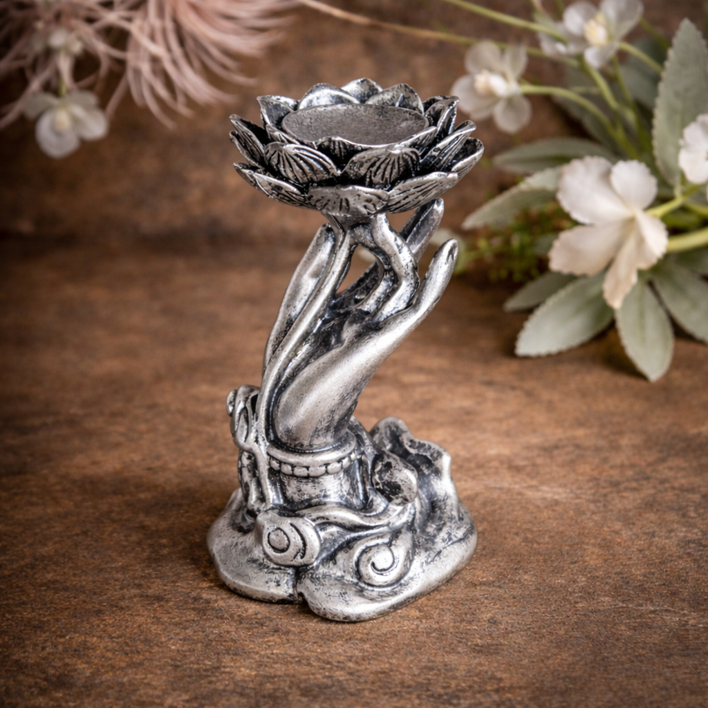 Hand holding lotus crystal sphere holder stand for spiritual healing, energy alignment and crystal display Australia