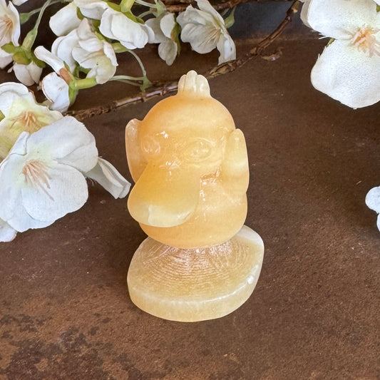 Orange Calcite Psyduck Pokémon Inspired Crystal Carving – Joy, Calm & Emotional Healing