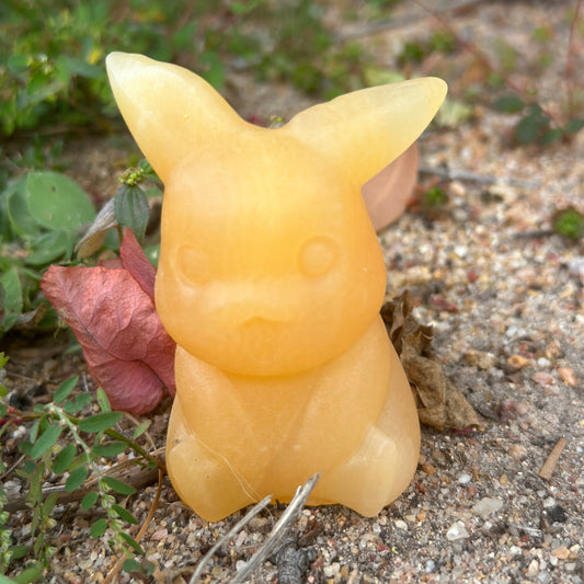 Pokémon-inspired Pikachu Orange Calcite Crystal Carving – Joy, Creativity & Spiritual Healing