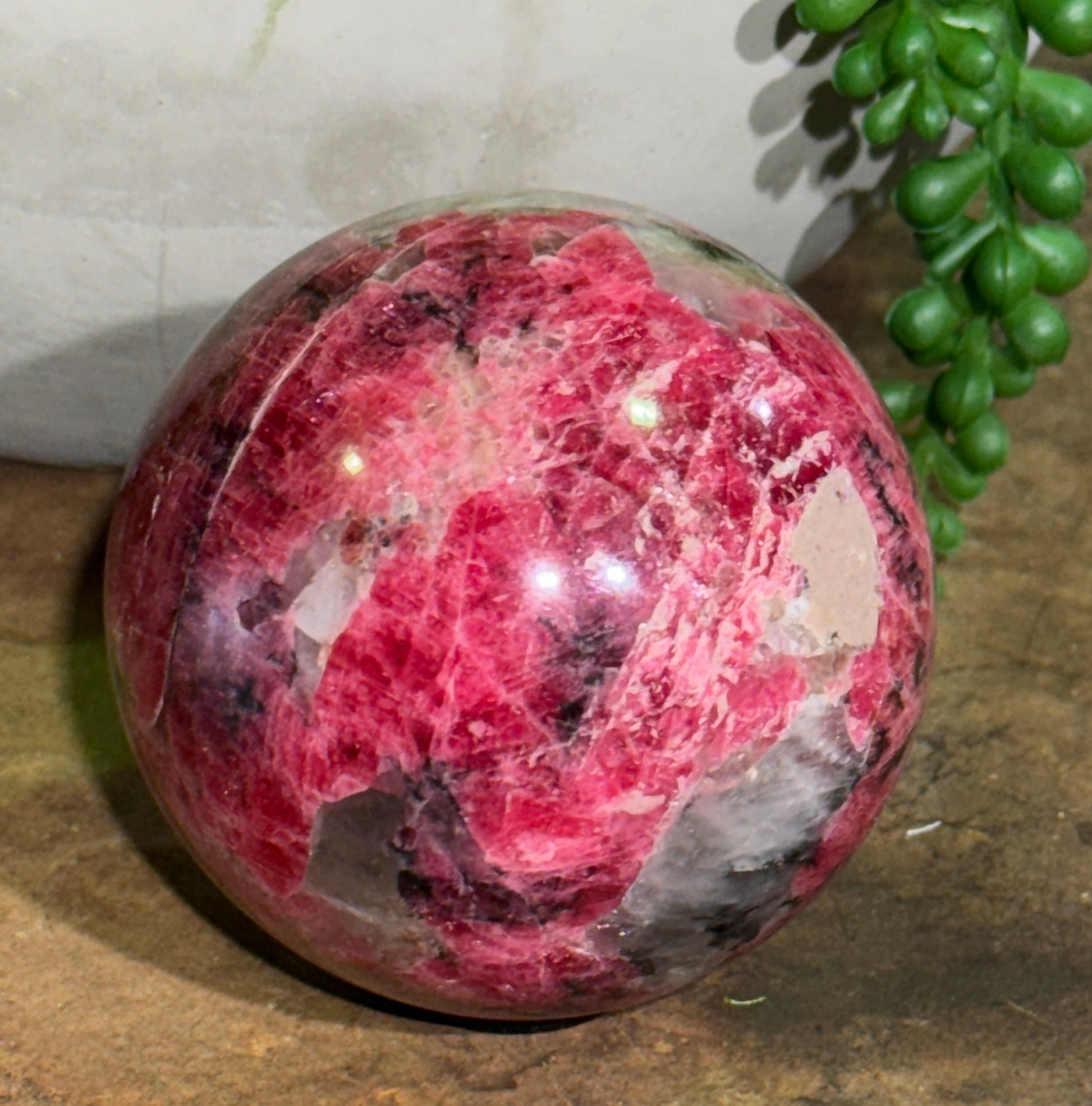Rhodonite Crystal Sphere for emotional healing, grief support, heart chakra healing, compassion, and balance