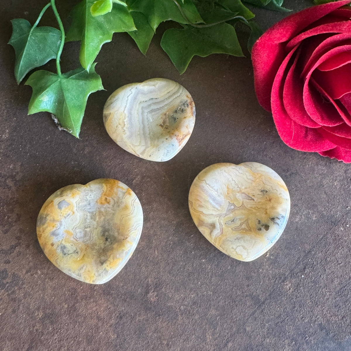 Crazy Lace Agate heart-shaped thumb stone for joy, balance and grounding