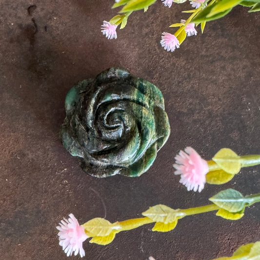 Emerald crystal flower carving for love growth harmony abundance and renewal