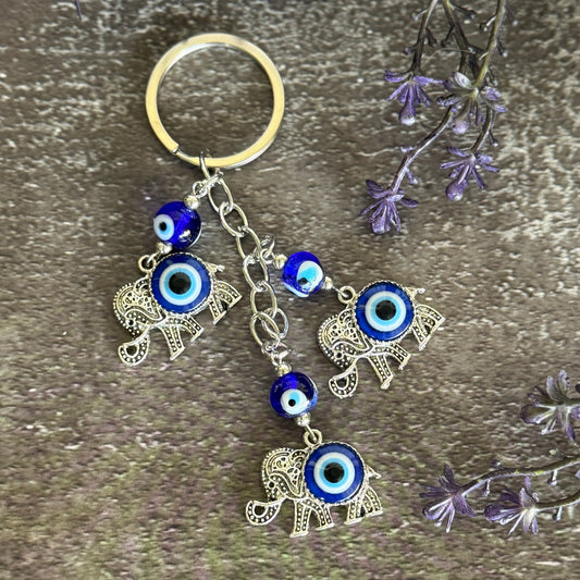 Lucky Elephants Evil Eye keychain for spiritual protection, abundance, emotional balance, and aura shielding