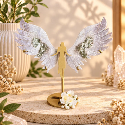 Moss Agate crystal wings on angel stand for grounding, renewal and divine protection