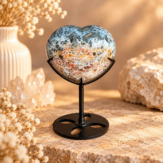 Natural Ocean Jasper crystal heart on dark stand – Piece 2