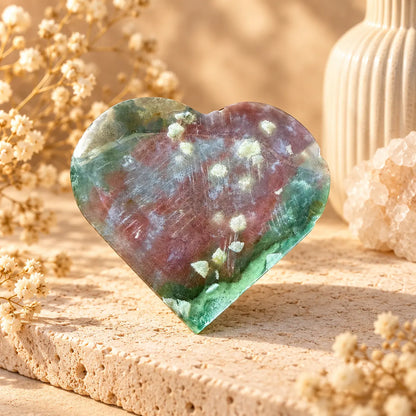 Large Ocean Jasper polished crystal heart front view with natural purple, green and cream patterns