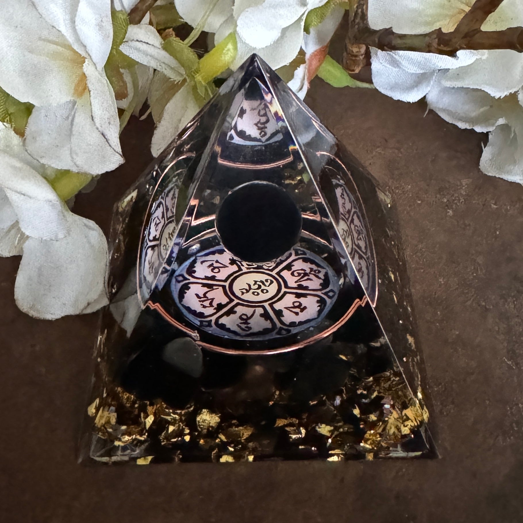 black obsidian orgonite pyramid with om mani padme hum for grounding, protection, clarity, and emotional balance