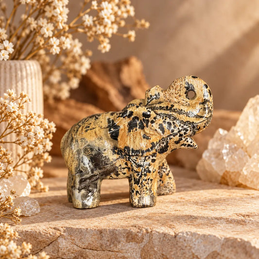 Picture Jasper crystal elephant carving with natural brown and cream landscape-like patterning, side view
