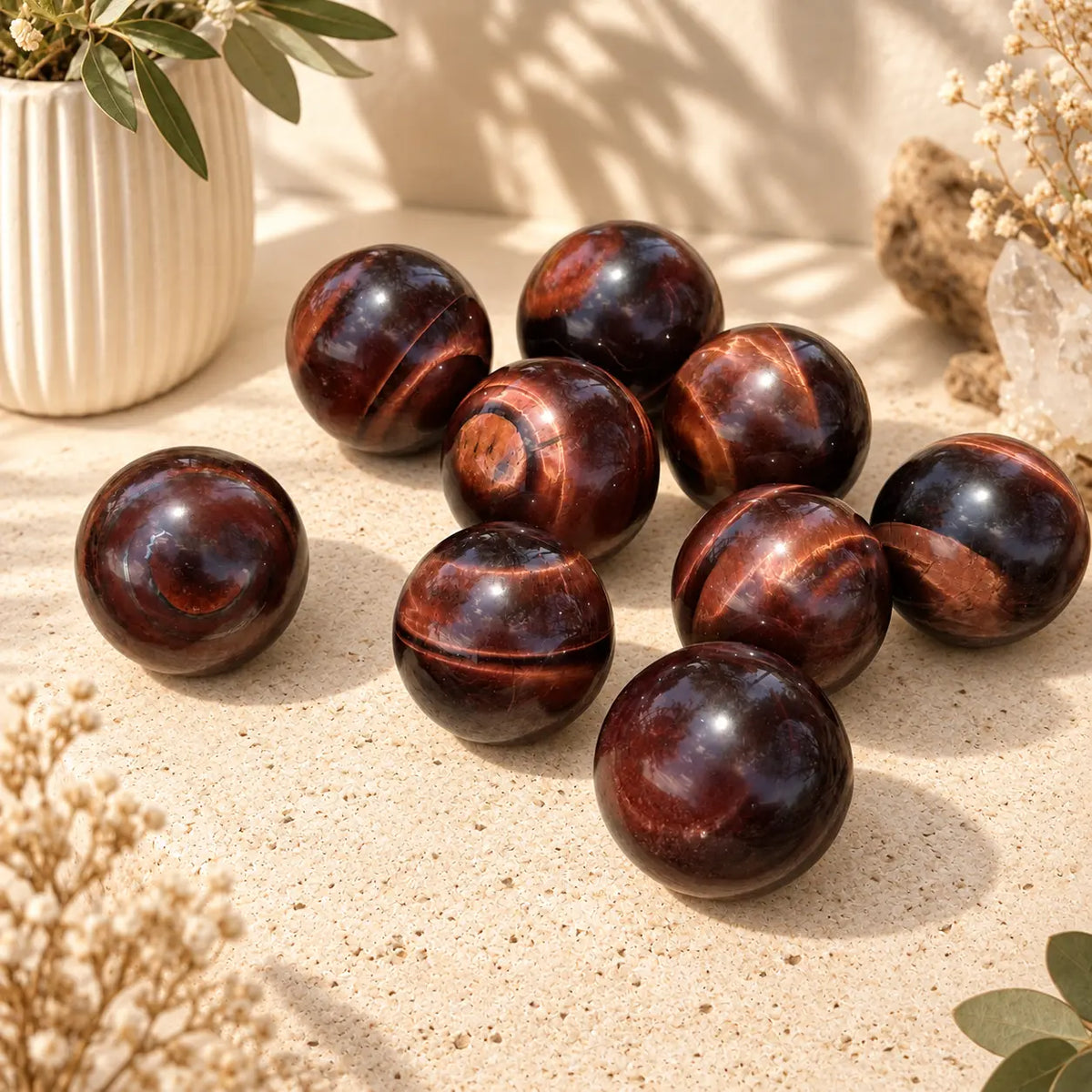 Red Tiger’s Eye crystal sphere approximately 3cm with red-brown chatoyancy