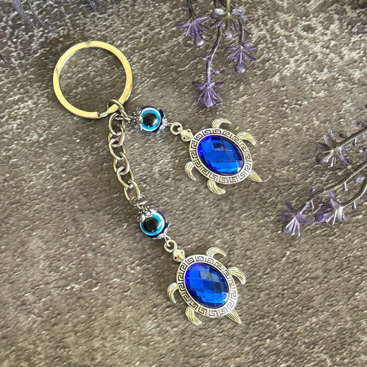Turtle Evil Eye keychain for spiritual protection, grounding, energy balance, and good fortune