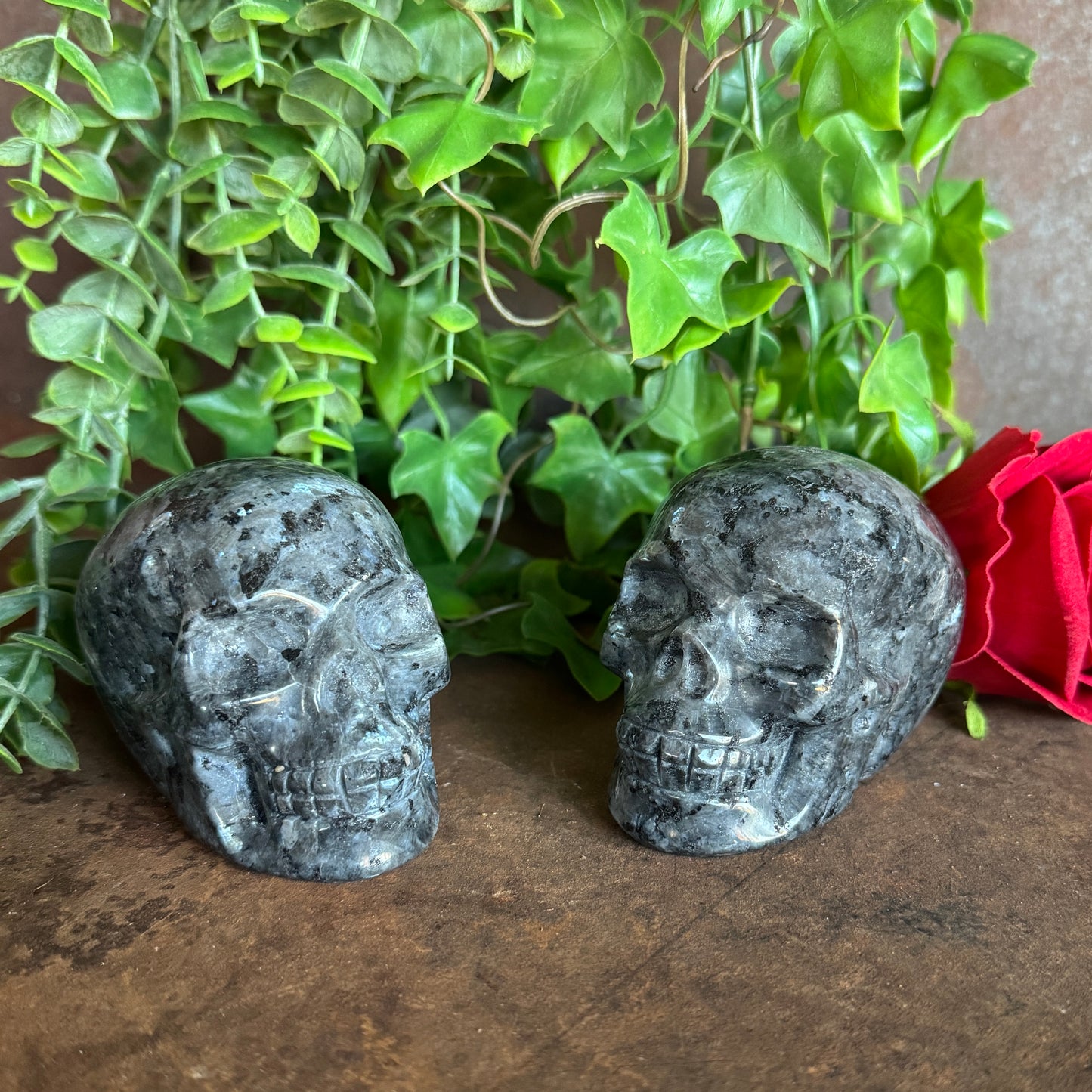 Two Lavakite Crystal Skull with blue green shimmer for protection, grounding, intuition, emotional healing and spiritual energy.