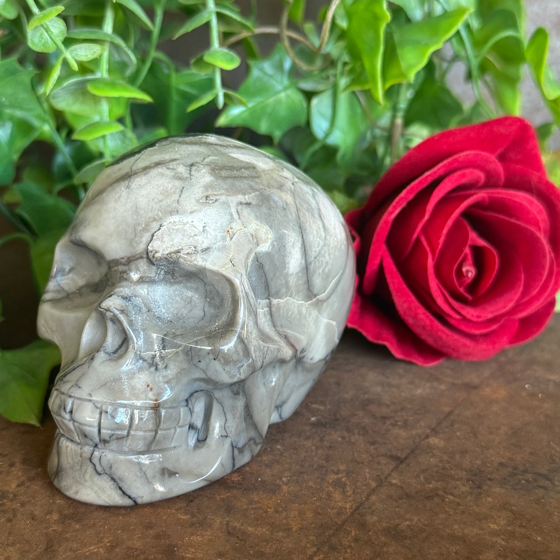 Hand-carved UV-reactive Volcanic Agate Crystal Skull 508g with green glow for spiritual protection, grounding, intuition, meditation, and sacred décor