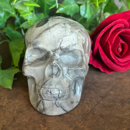 Hand-carved UV-reactive Volcanic Agate Crystal Skull 508g with green glow for spiritual protection, grounding, intuition, meditation, and sacred décor