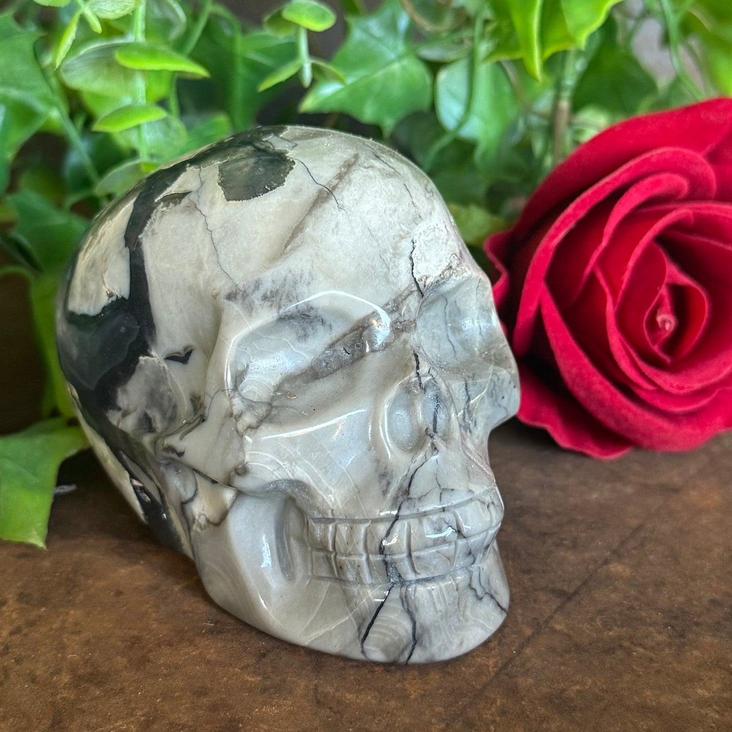 Hand-carved UV-reactive Volcanic Agate Crystal Skull 508g with green glow for spiritual protection, grounding, intuition, meditation, and sacred décor