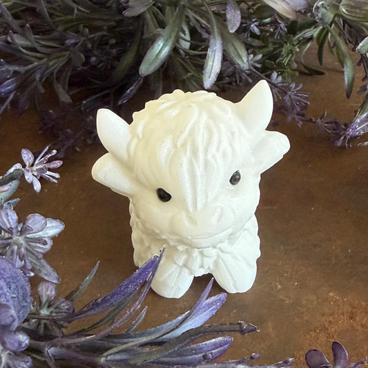 White Jade Highland Cow crystal carving with smooth pale tones and hand-carved details