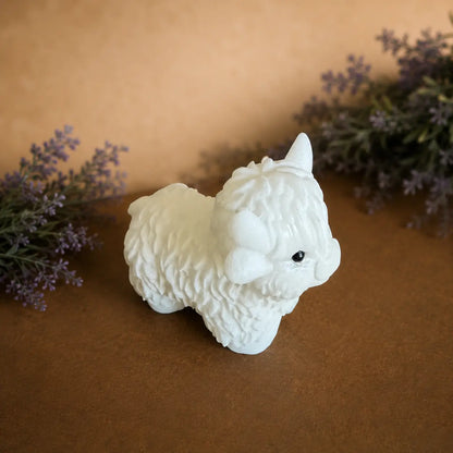 White Jade Highland Cow crystal carving with smooth pale tones and hand-carved details