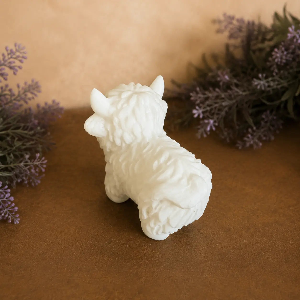 White Jade Highland Cow crystal carving with smooth pale tones and hand-carved details